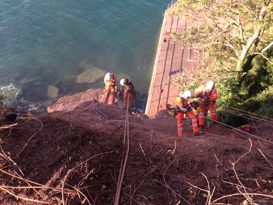 Using Rope Access to work on a steep cliff face